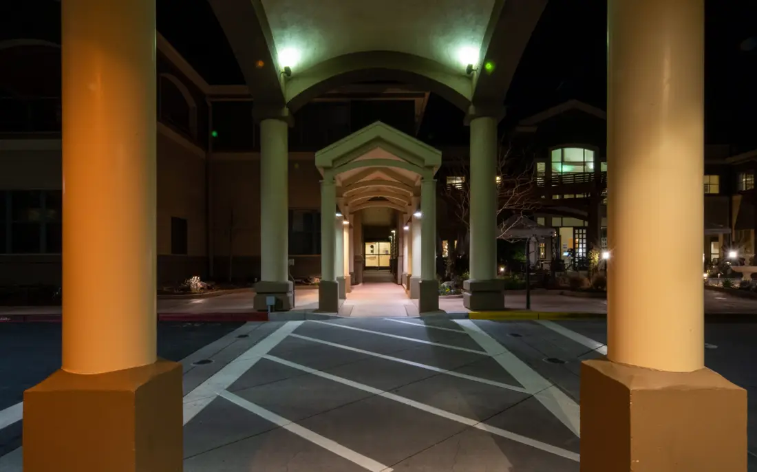 Before: Covered parking and entry